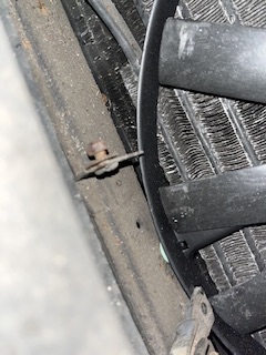 Not the best photography but it’s a bit crowded. There is a second identical bracket to the right of the fan shroud.